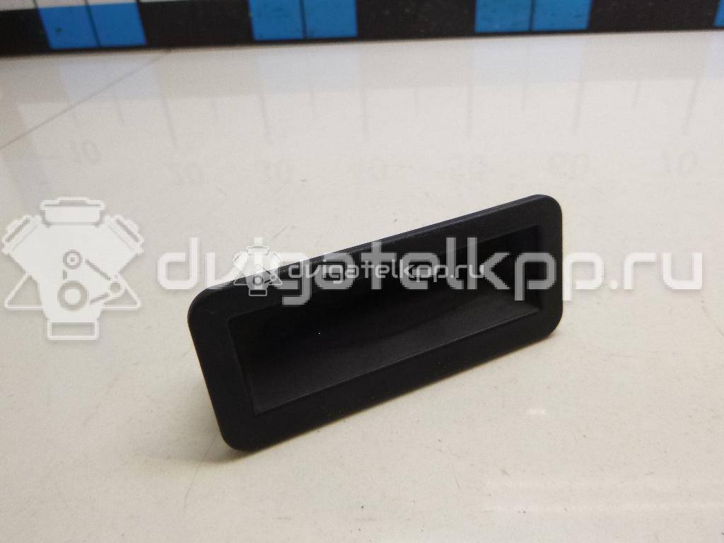 Фото Кнопка открывания багажника  1857333 для Ford Fiesta / Focus / C-Max / Galaxy / Kuga {forloop.counter}}