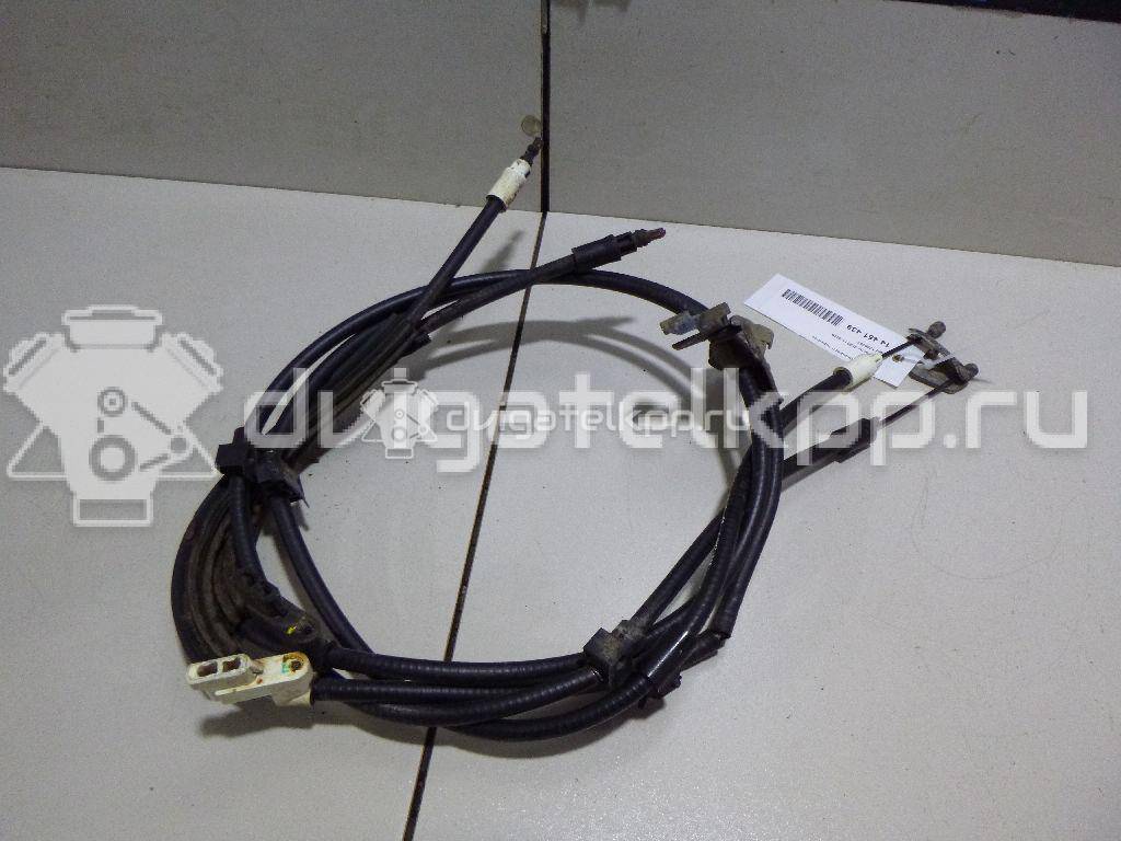 Фото Трос стояночного тормоза  1755767 для Ford Focus / C-Max {forloop.counter}}