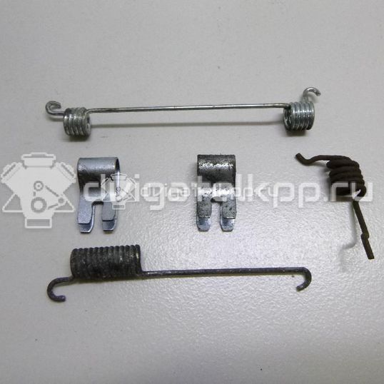 Фото К-кт установочный задних колодок  1075555 для Ford Focus