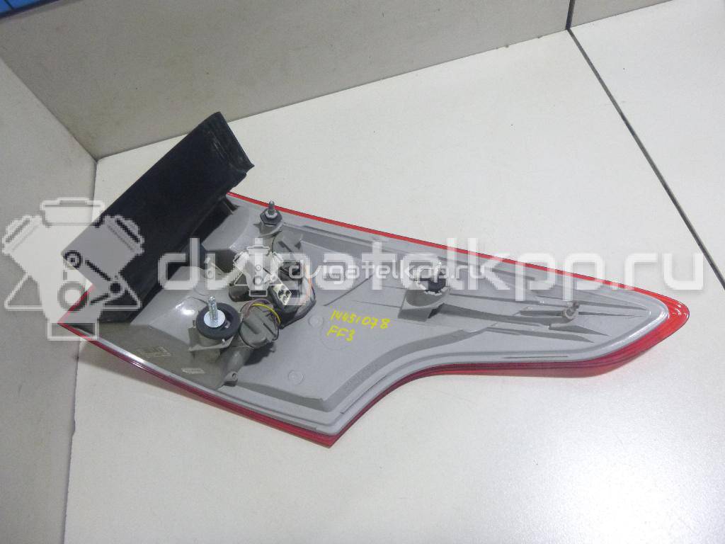 Фото Фонарь задний наружный левый  1785514 для Ford Focus {forloop.counter}}