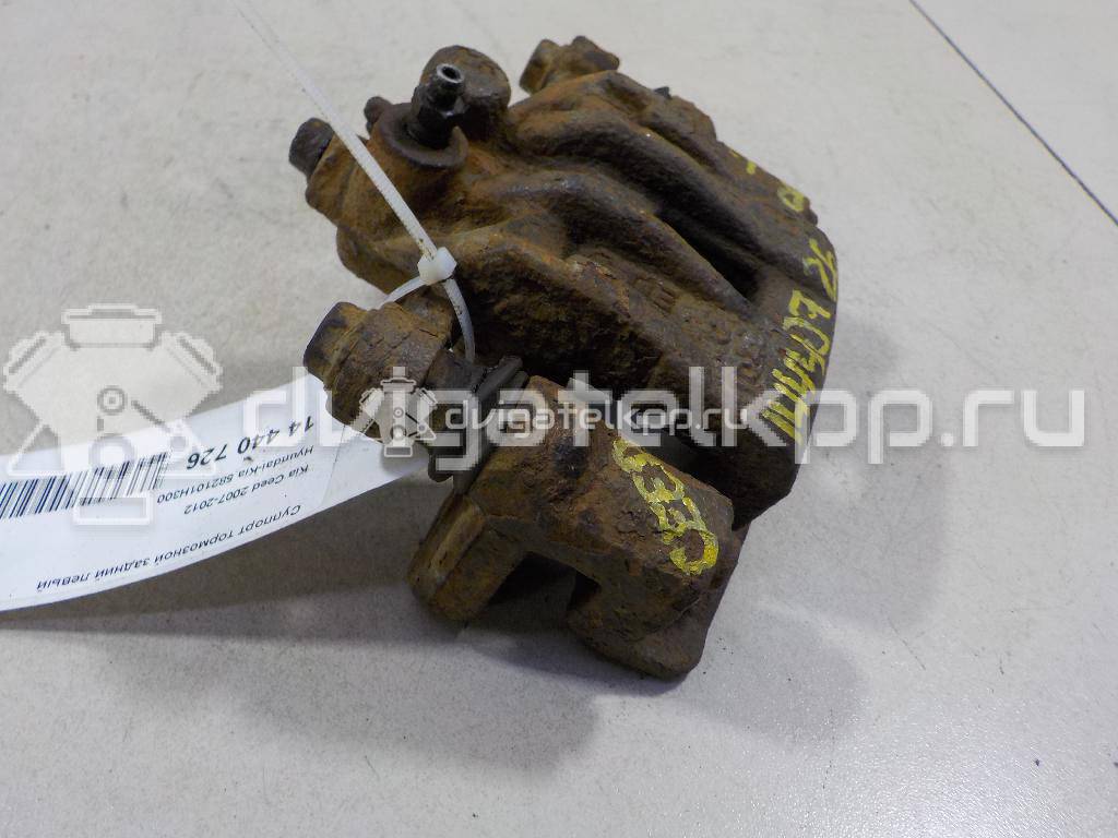 Фото Суппорт тормозной задний левый  582101H300 для Hyundai I30 {forloop.counter}}