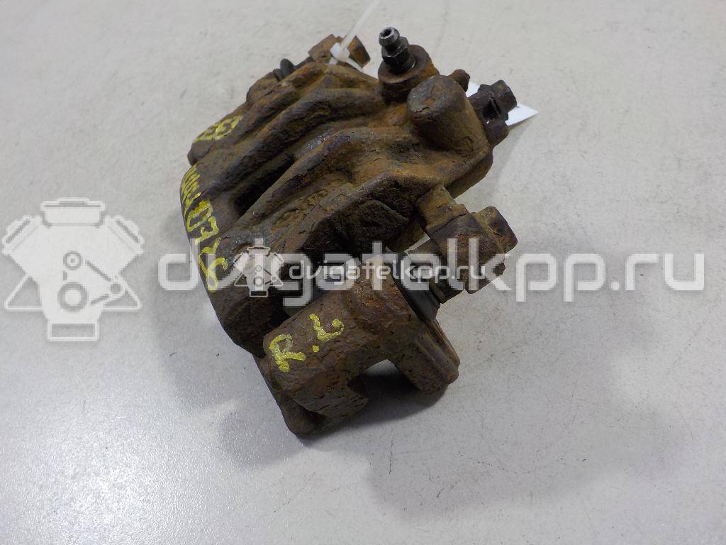 Фото Суппорт тормозной задний левый  582101H300 для Hyundai I30 {forloop.counter}}