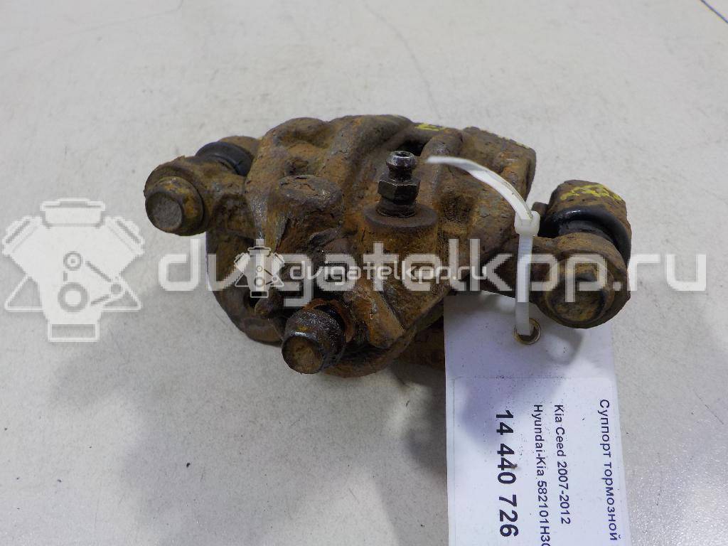 Фото Суппорт тормозной задний левый  582101H300 для Hyundai I30 {forloop.counter}}