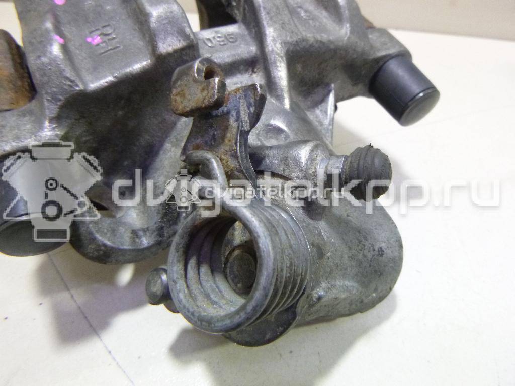 Фото Суппорт тормозной задний правый  1365648 для mazda Mazda 3 (BK) {forloop.counter}}