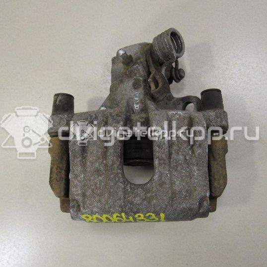 Фото Суппорт тормозной задний правый  1365648 для mazda Mazda 3 (BK)