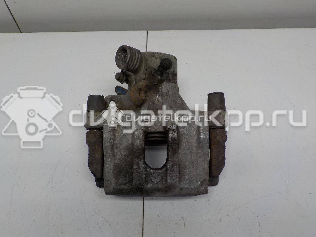 Фото Суппорт тормозной задний левый  1365653 для mazda Mazda 3 (BK) {forloop.counter}}