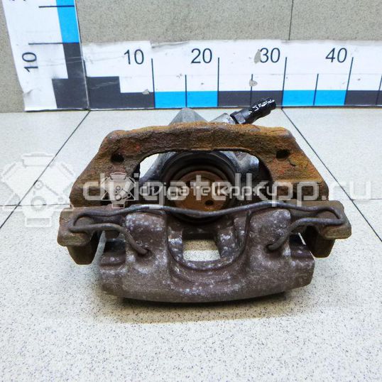 Фото Суппорт тормозной задний левый  1365653 для mazda Mazda 3 (BK)
