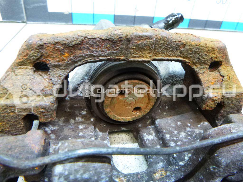 Фото Суппорт тормозной задний левый  1365653 для mazda Mazda 3 (BK) {forloop.counter}}