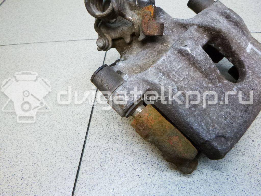 Фото Суппорт тормозной задний левый  1365653 для mazda Mazda 3 (BK) {forloop.counter}}