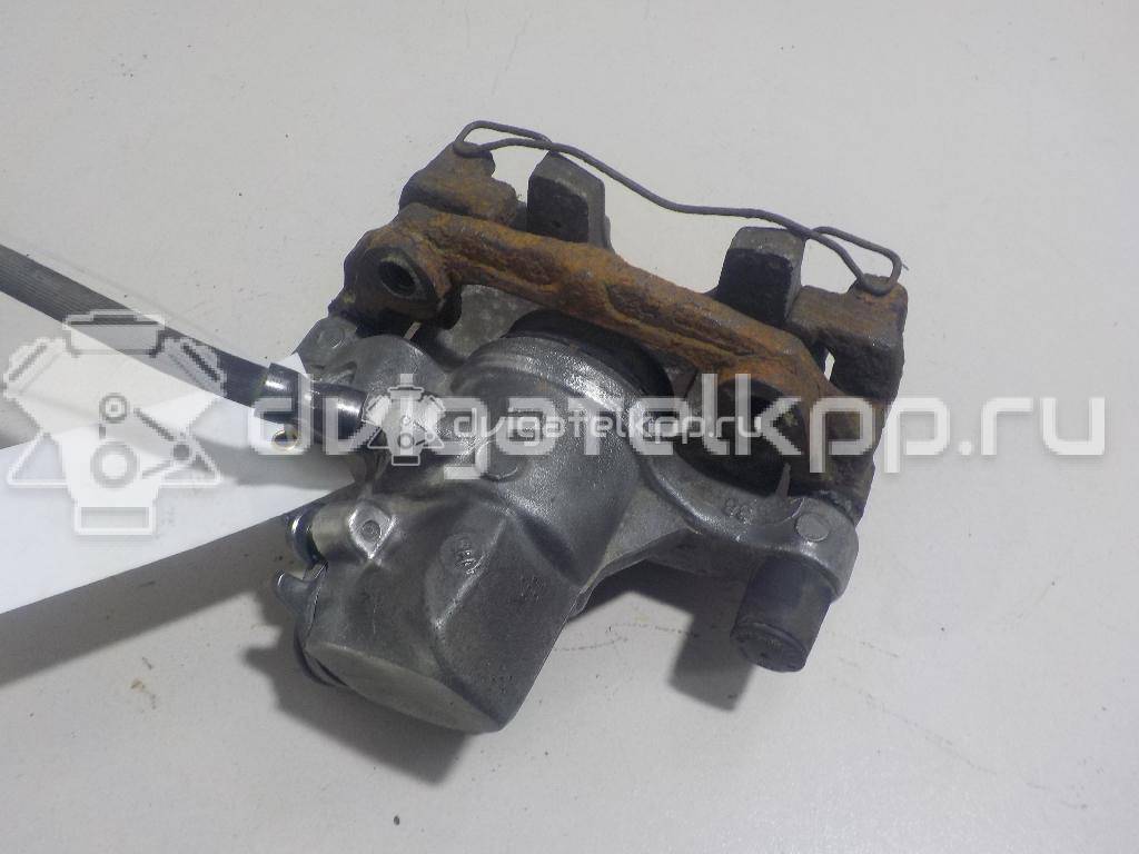 Фото Суппорт тормозной задний левый  1365653 для mazda Mazda 3 (BK) {forloop.counter}}