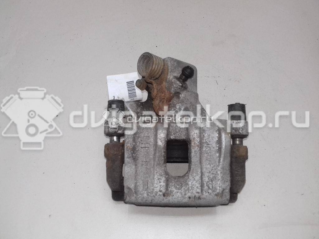 Фото Суппорт тормозной задний левый  1365653 для mazda Mazda 3 (BK) {forloop.counter}}