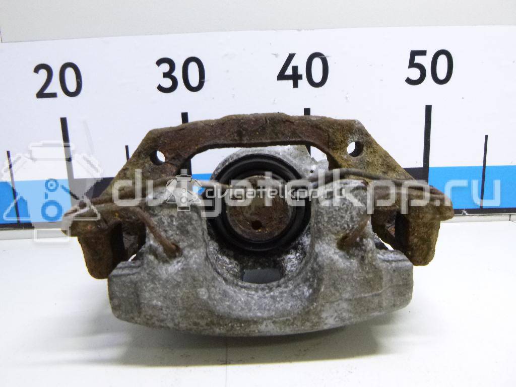 Фото Суппорт тормозной задний левый  1365653 для mazda Mazda 3 (BK) {forloop.counter}}