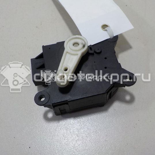 Фото Моторчик заслонки отопителя  27730ax015 для Nissan Micra
