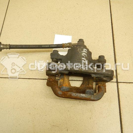 Фото Суппорт тормозной задний правый  440011KD0A для Nissan Tiida / Qashqai / Cube Z12 / Juke F15 / Pulsar C13