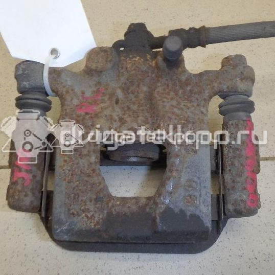 Фото Суппорт тормозной задний правый  440011KD0A для Nissan Tiida / Qashqai / Cube Z12 / Juke F15 / Pulsar C13