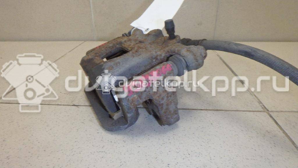 Фото Суппорт тормозной задний правый  440011KD0A для Nissan Tiida / Qashqai / Cube Z12 / Juke F15 / Pulsar C13 {forloop.counter}}