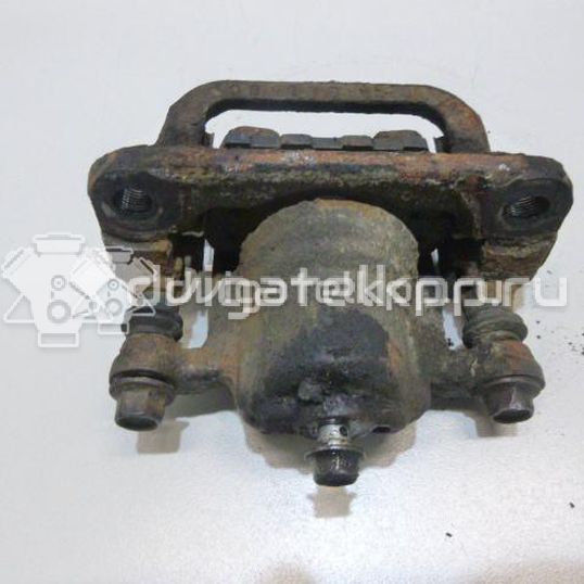 Фото Суппорт тормозной задний левый  440111KD0A для Nissan Tiida / Qashqai / Cube Z12 / Juke F15 / Pulsar C13