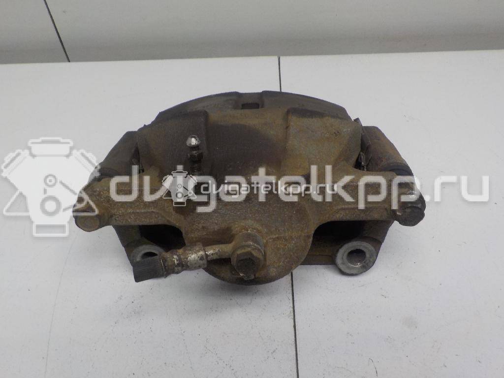 Фото Суппорт тормозной передний левый  410114EA0A для Nissan Qashqai {forloop.counter}}