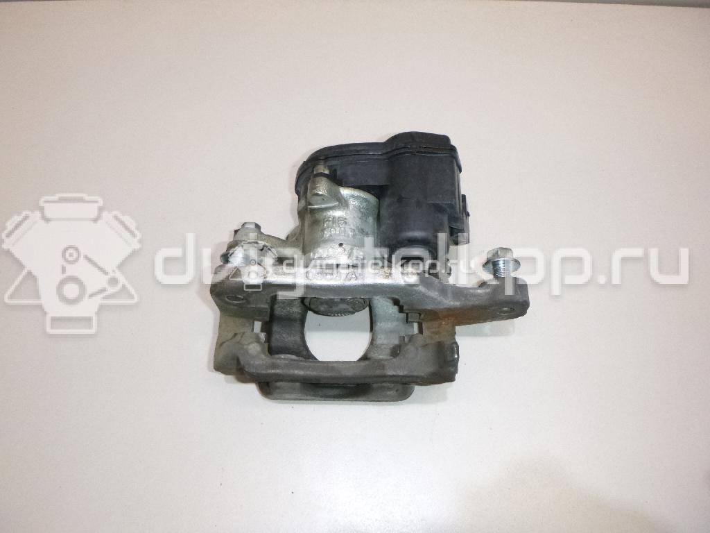 Фото Суппорт тормозной задний левый  440114EA0A для Nissan Qashqai {forloop.counter}}