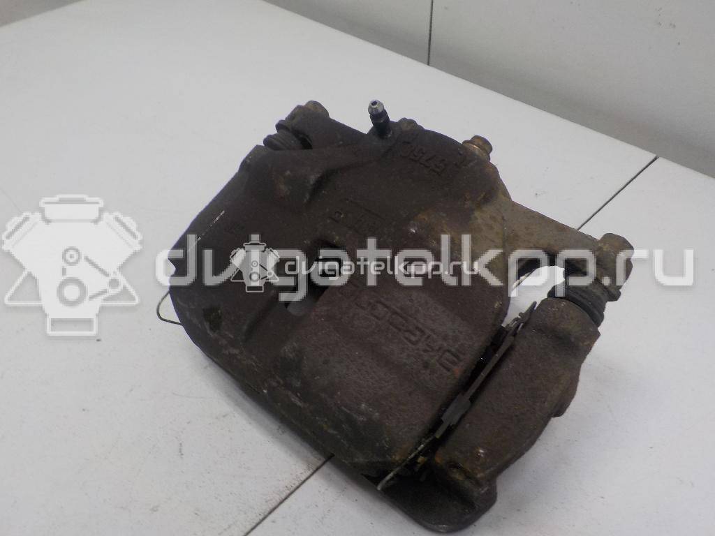 Фото Суппорт тормозной передний правый  410014EA0A для Nissan Qashqai {forloop.counter}}