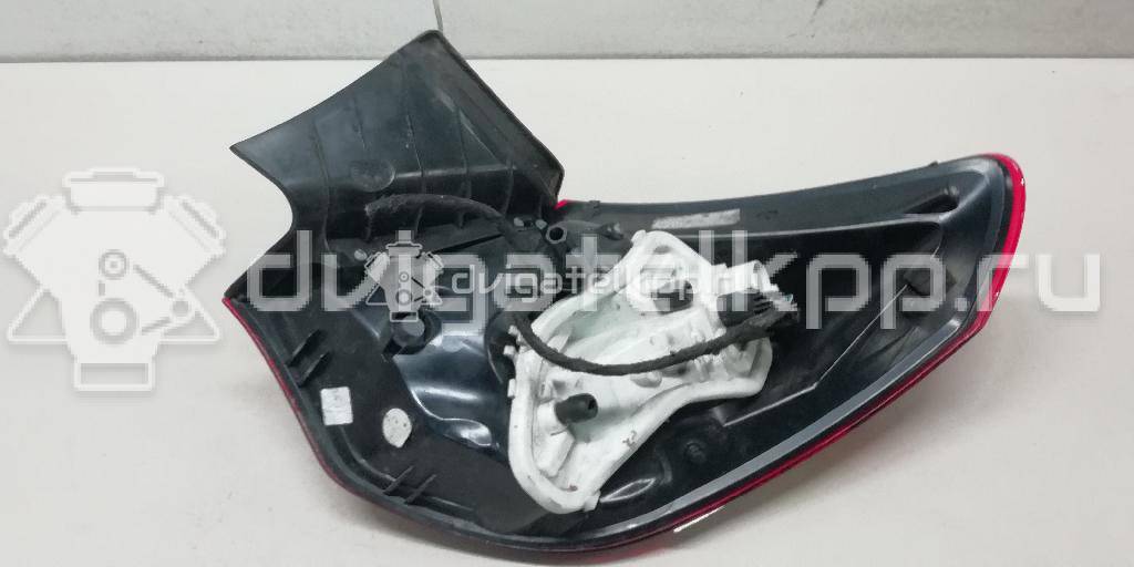 Фото Фонарь задний наружный левый  1222209 для Opel Astra {forloop.counter}}