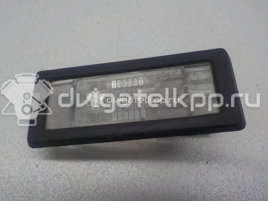 Фото Фонарь подсветки номера  8200013577 для Renault Modus Grand F Jp0 / Megane / Clio / Laguna / Scénic {forloop.counter}}