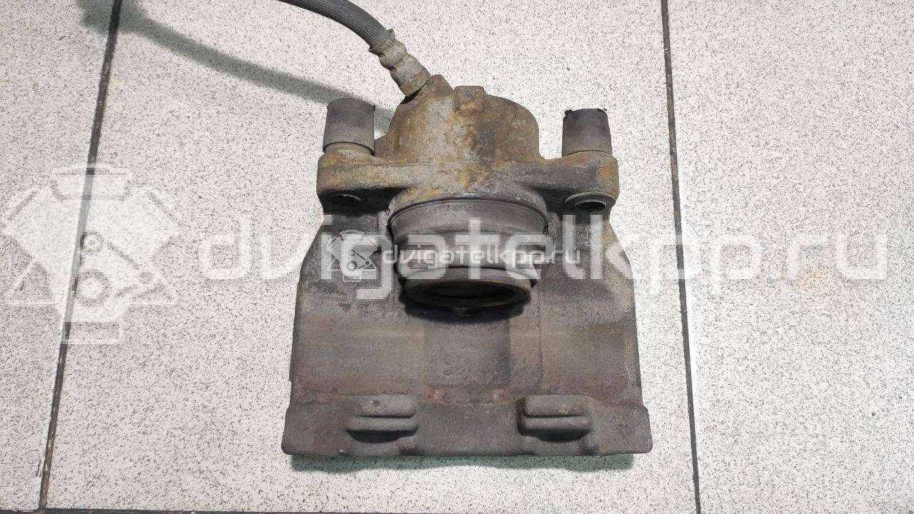 Фото Суппорт тормозной передний левый  410111495R для Renault Megane / Scénic / Grand / Captur J5 / Fluence L30 {forloop.counter}}