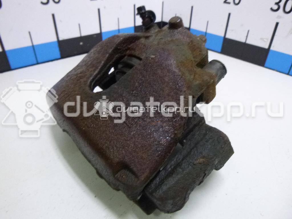 Фото Суппорт тормозной передний правый  5542107 для saab 9-3 {forloop.counter}}