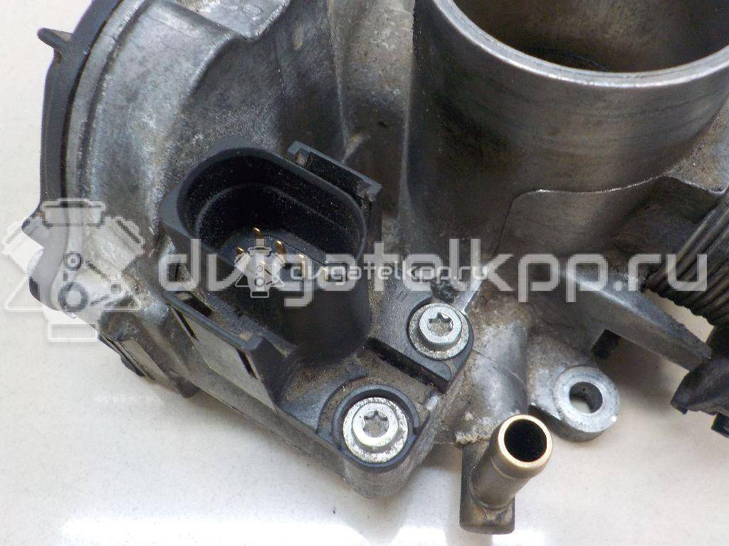 Фото Заслонка дроссельная электрическая  030133064D для Volkswagen Polo / Caddy / Vento 1H2 / Golf {forloop.counter}}