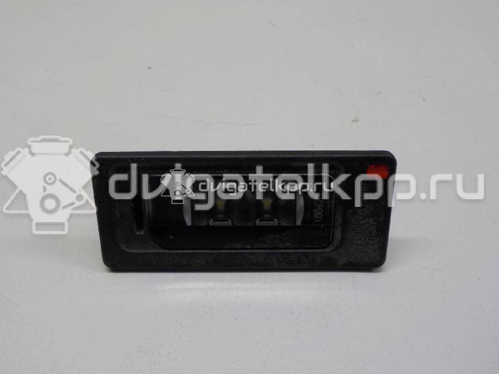 Фото Фонарь подсветки номера  3AF943021A для Volkswagen Tiguan / Touran / Cc / Multivan / Sharan {forloop.counter}}