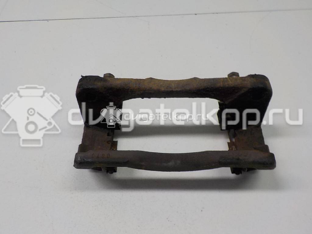 Фото Скоба суппорта переднего  5586062J10 для Suzuki Splash Ex / Sx4 / Swift {forloop.counter}}