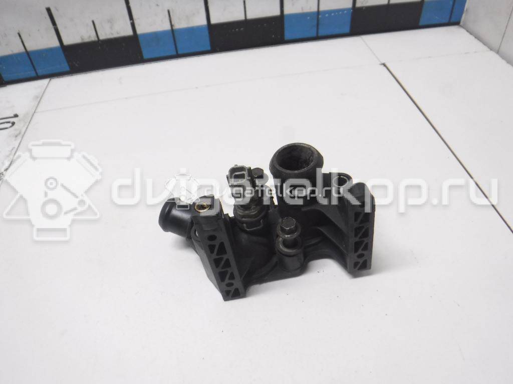 Фото Фланец двигателя системы охлаждения  1531004 для Ford Fiesta / Focus / Puma Ec / Fusion Ju {forloop.counter}}