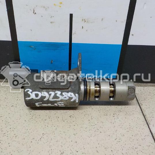 Фото Клапан электромагн. изменения фаз ГРМ  2003597 для Ford Fiesta / Focus / C-Max / Galaxy / Grand