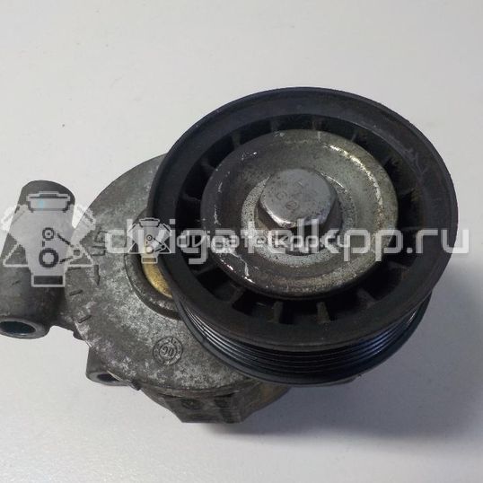 Фото Ролик-натяжитель ручейкового ремня  3M5Q6A228AD для Ford Fiesta / Focus / Transit / C-Max
