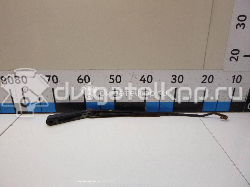 Фото Поводок стеклоочистителя передний левый  1064744 для Ford Focus {forloop.counter}}