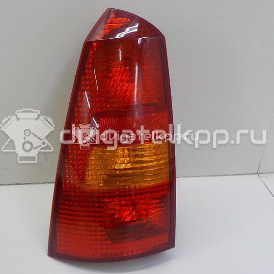 Фото Фонарь задний левый  1233323 для Ford Focus
