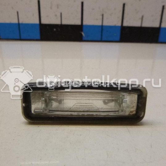 Фото Фонарь подсветки номера  1109489 для Ford Focus