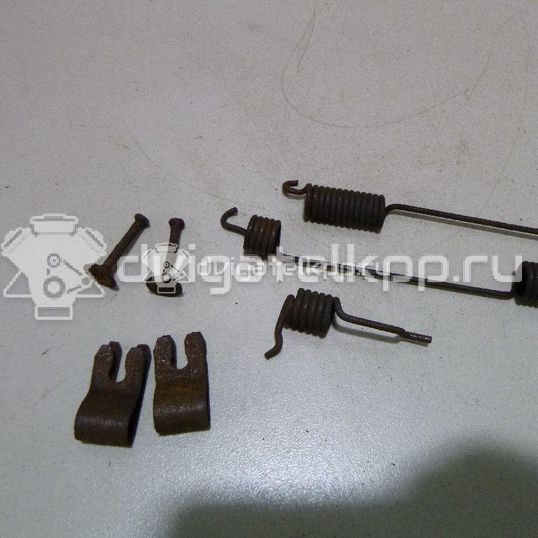 Фото К-кт установочный задних колодок  1075555 для Ford Focus
