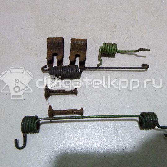 Фото К-кт установочный задних колодок  1075555 для Ford Focus