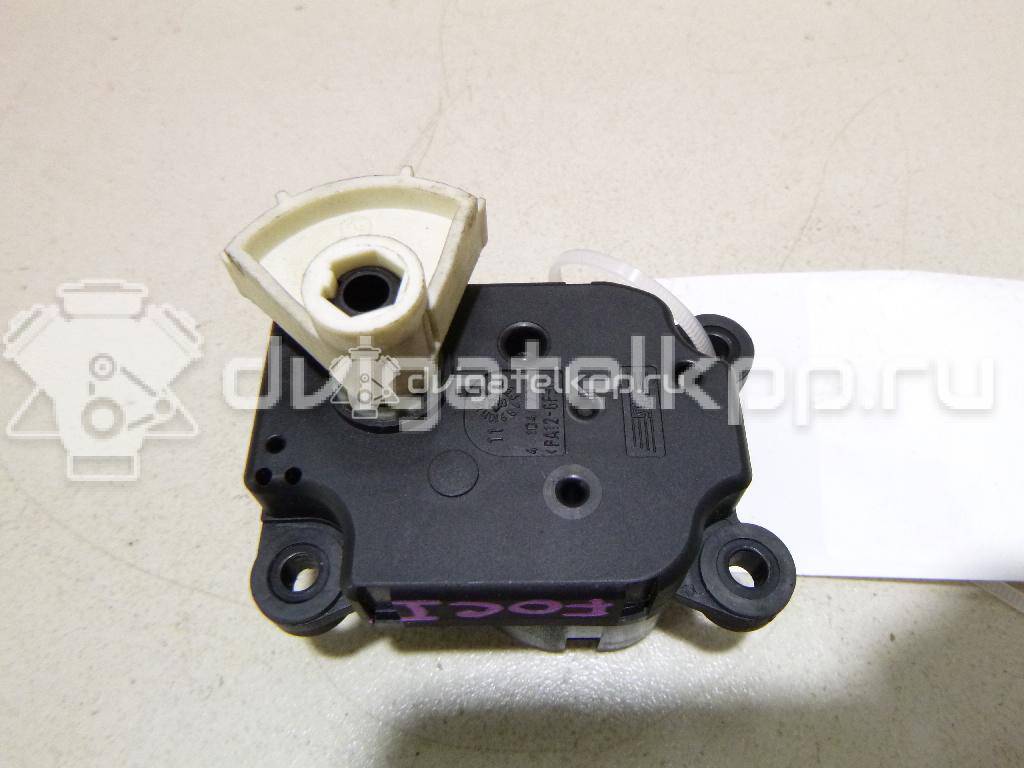 Фото Моторчик заслонки отопителя  1S7H19E616AA для Ford Focus / Mondeo {forloop.counter}}