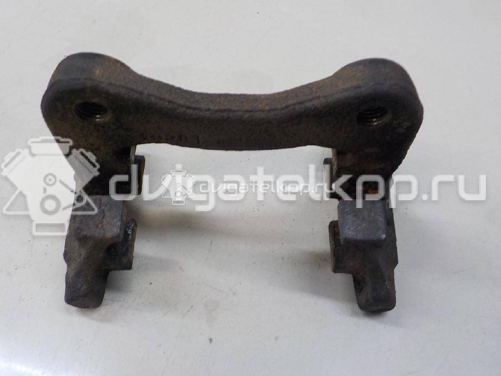 Фото Скоба суппорта заднего  1001961 для Ford Fiesta / Focus / Galaxy {forloop.counter}}