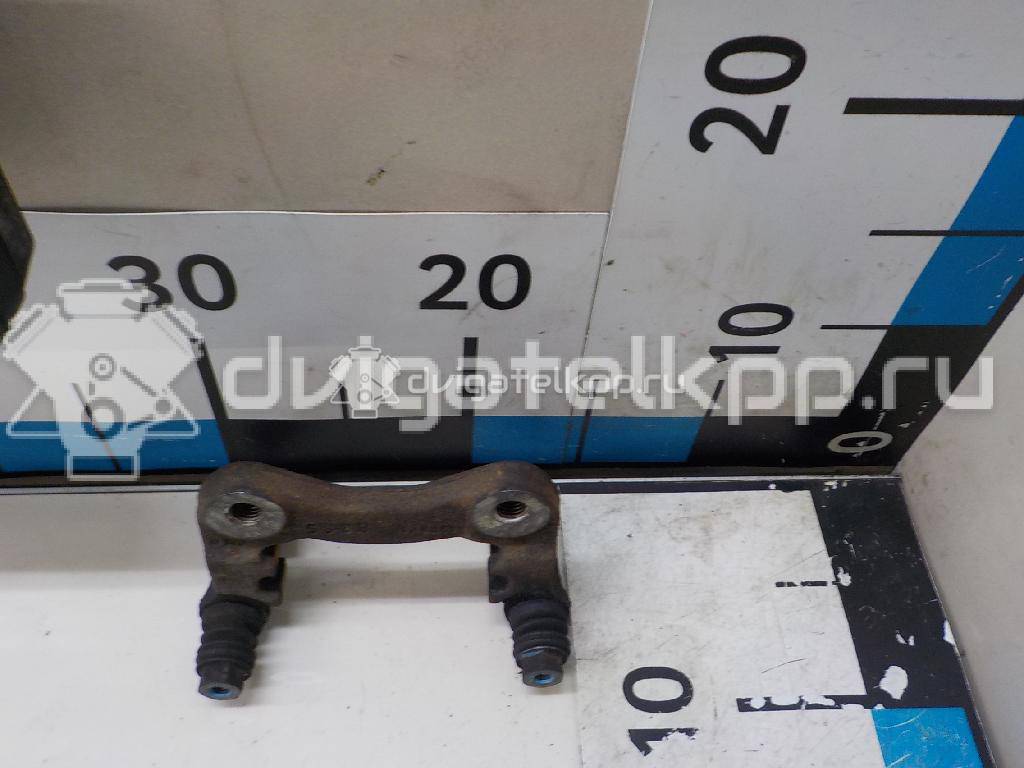 Фото Скоба суппорта заднего  1001961 для Ford Fiesta / Focus / Galaxy {forloop.counter}}