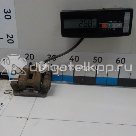 Фото Суппорт тормозной задний левый  582101H300 для Hyundai I30