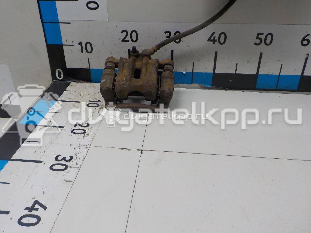 Фото Суппорт тормозной задний левый  582101H300 для Hyundai I30 {forloop.counter}}