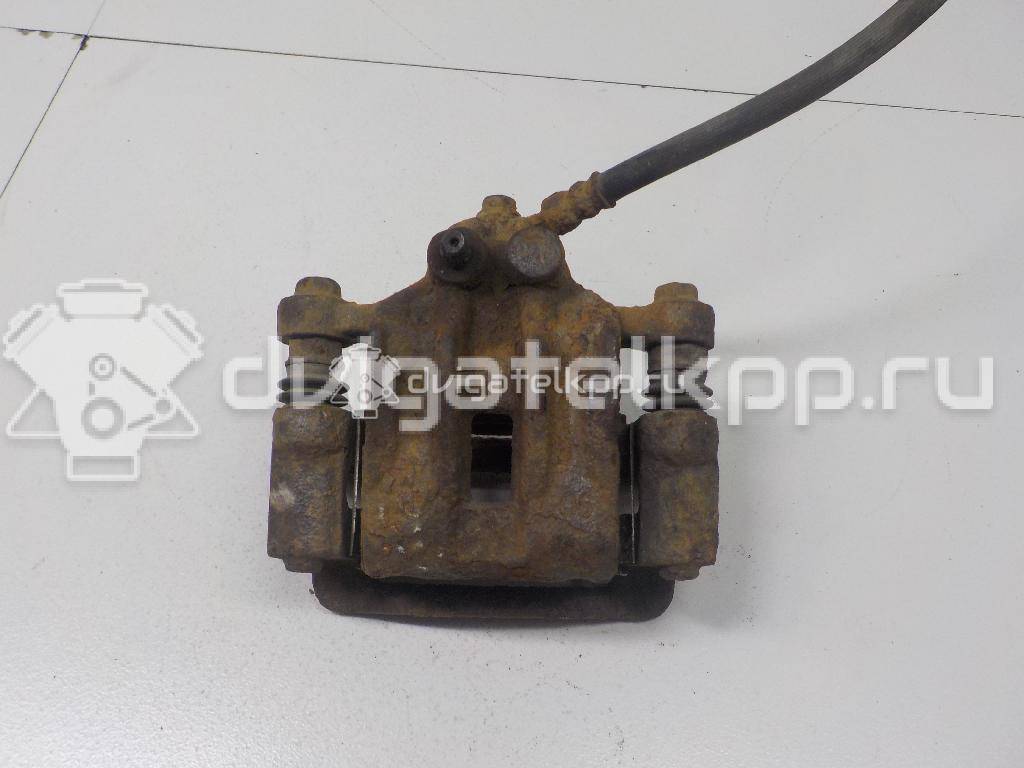 Фото Суппорт тормозной задний левый  582101H300 для Hyundai I30 {forloop.counter}}