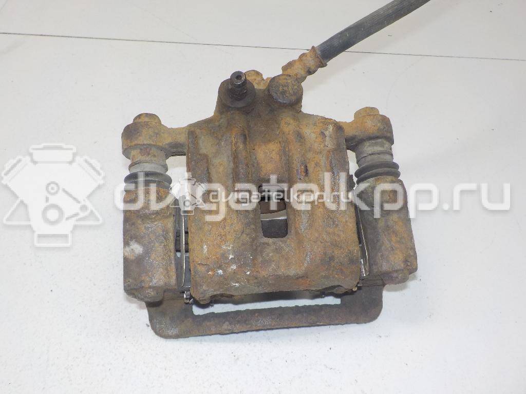 Фото Суппорт тормозной задний левый  582101H300 для Hyundai I30 {forloop.counter}}