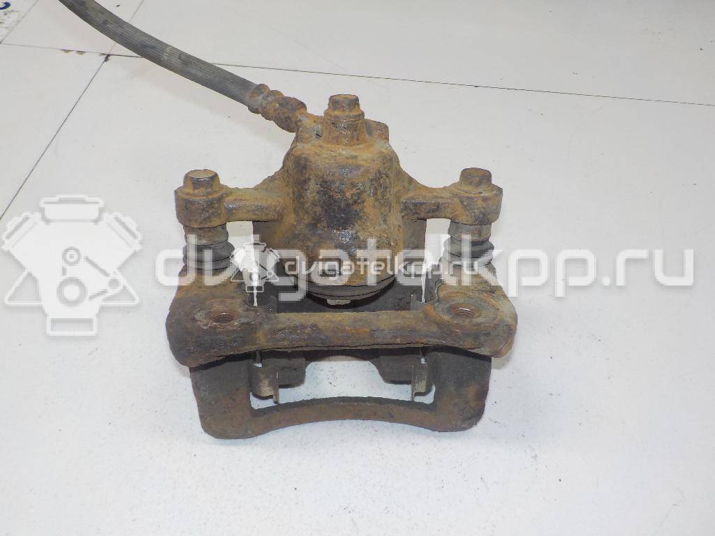 Фото Суппорт тормозной задний левый  582101H300 для Hyundai I30 {forloop.counter}}