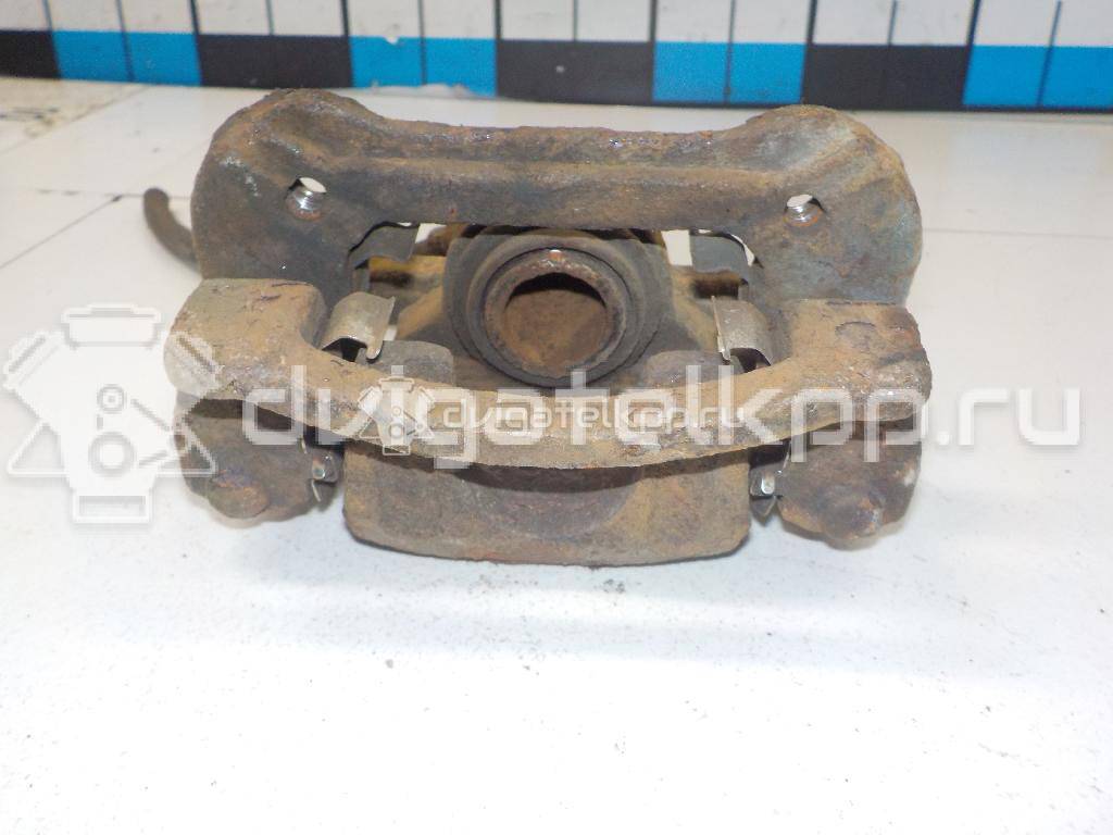 Фото Суппорт тормозной задний левый  582101H300 для Hyundai I30 {forloop.counter}}