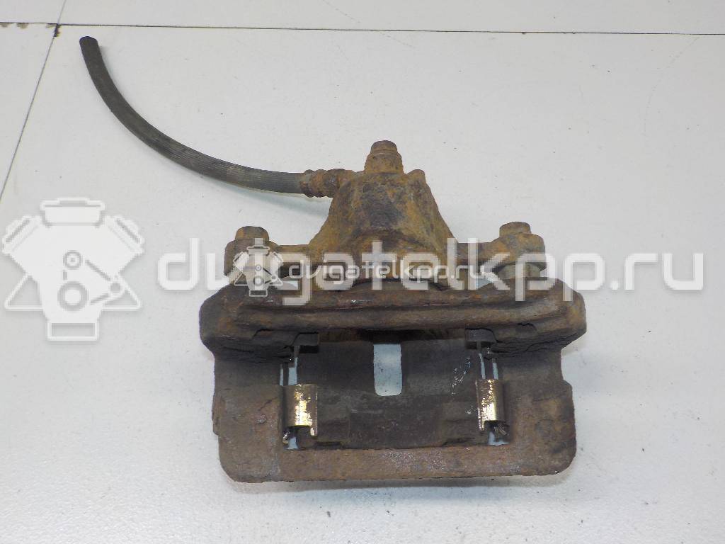 Фото Суппорт тормозной задний левый  582101H300 для Hyundai I30 {forloop.counter}}