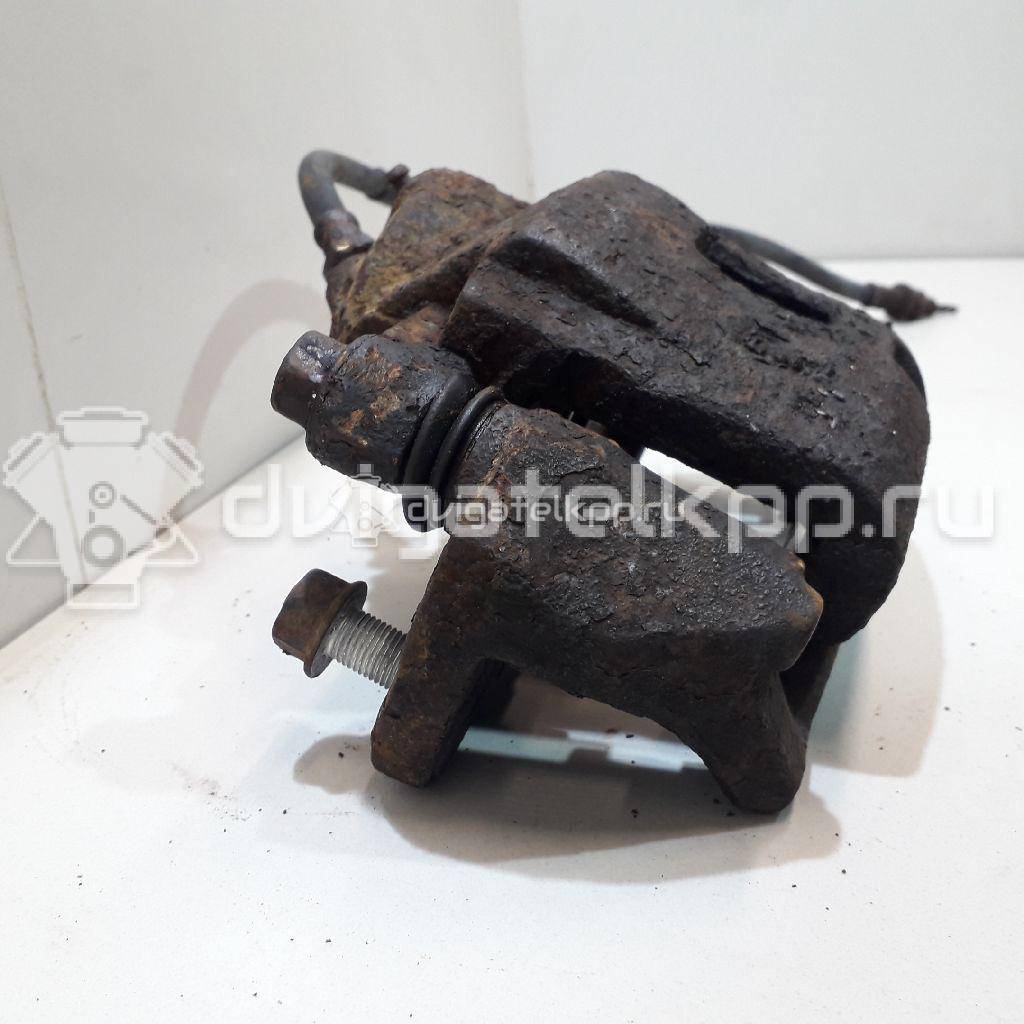 Фото Суппорт тормозной передний левый  K0BB149990 для Kia Rio / Shuma Fb {forloop.counter}}